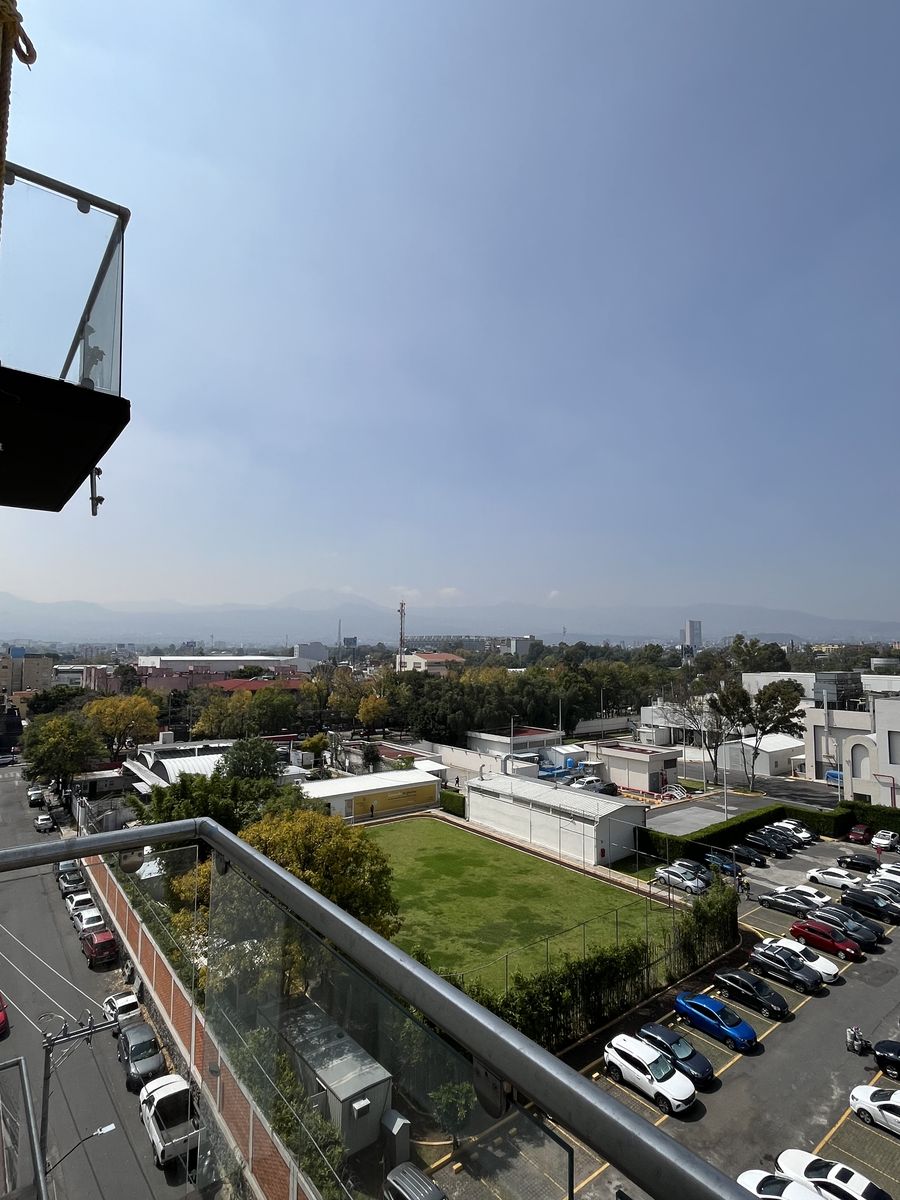 Vista desde el balcón hacia áreas verdes